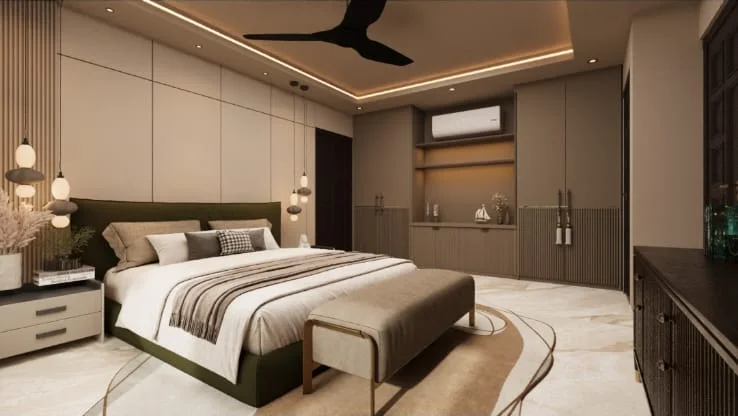 Master bedroom showing the panelled upholstered headboard wall with cove lighting above and dark wardrobes at the side
