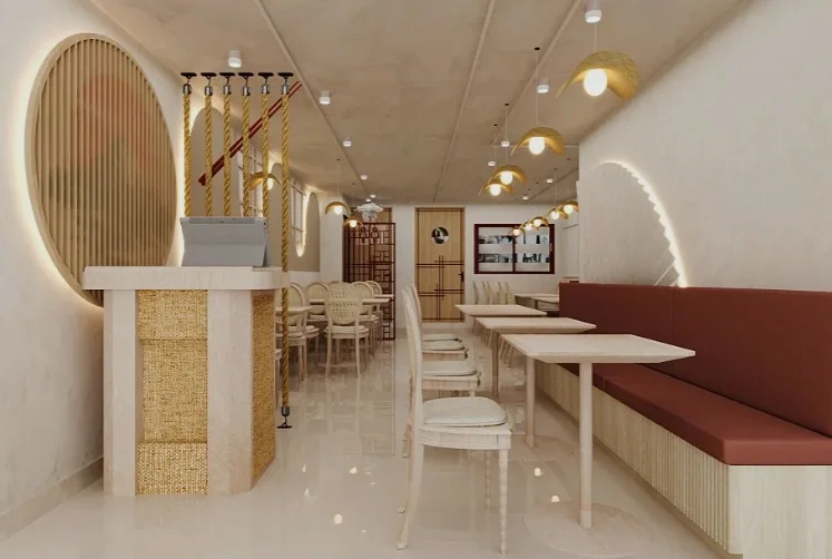 Cafe interior with a rope-and-pendant arched entrance feature, rattan and bentwood seating, a cane-panelled reception front and basket-shade dome pendant lights