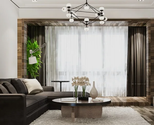 Contemporary living room with a dark L-shaped sofa, a wood-framed feature recess around the window, floor-to-ceiling curtains and a globe-cluster chandelier
