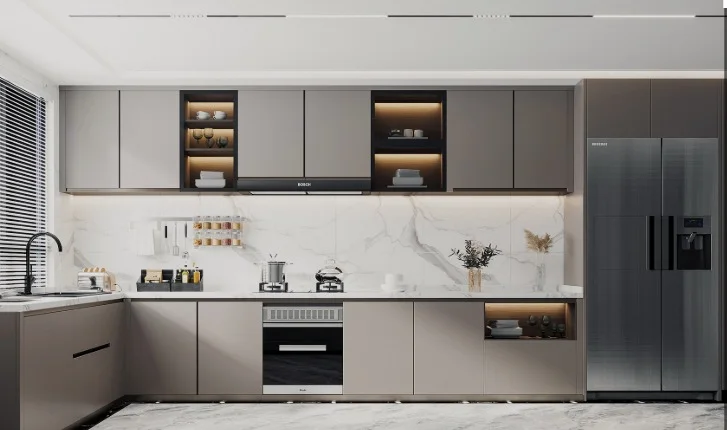 L-shaped modular kitchen in grey matte finish with amber under-cabinet LED lighting and open display shelves